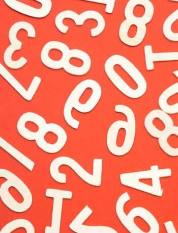white numbers spread out across orange background