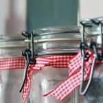 large mason jars with red gingham ribbon