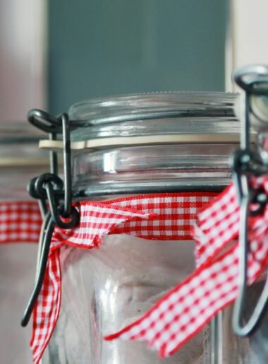 large mason jars with red gingham ribbon