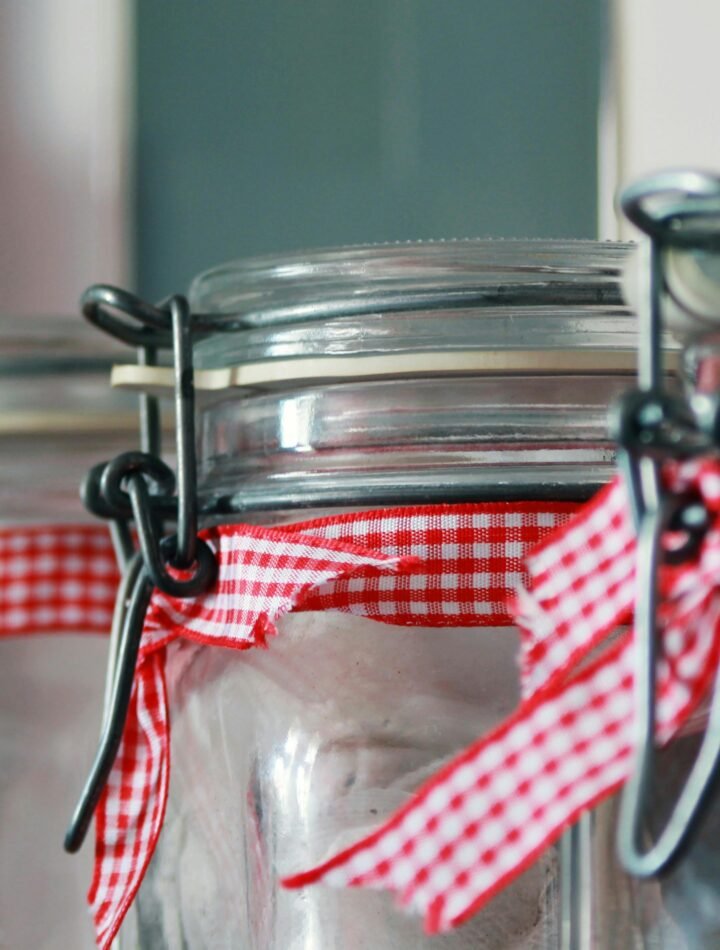 large mason jars with red gingham ribbon
